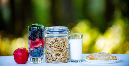 Healthy food in jar for mindful eating. Healthy food for daily eating. Healthy food for organic nutrition. Healthy food with whole grain for vitality. Muesli for fiber. Granola for breakfast.の写真素材