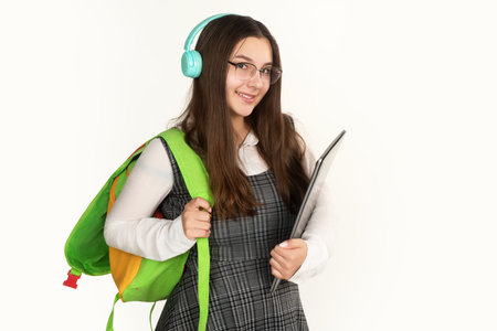 Student school girl with backpack and laptop. Student learning. Student with backpack for study. Student portrait for university learning.の写真素材