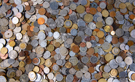 Coins background with international coin mix. Coins background for money design use. Coins...