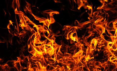Fire dramatic flame texture. Fire hot blaze motion. Fire burning energy flow. Fire intense glowing...