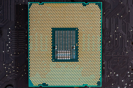 Processor on computer hardware. Circuit board in close-up background with processor chip. Circuit...