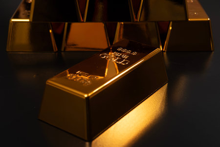 Luxury gold bullion. Fine gold concept. Gold bar in golden luxury. Gold reserve bullion bars.の写真素材