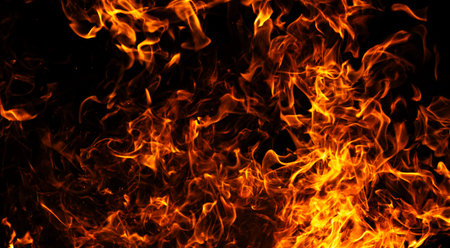 Fire fiery motion background. Fire hot glowing flames. Fire intense burning energy. Fire dramatic...