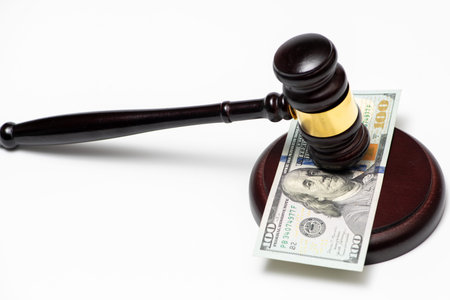Banknote slips, gavel orders prosecution. Gavel mallet drops, contract breaks. Money fuels...