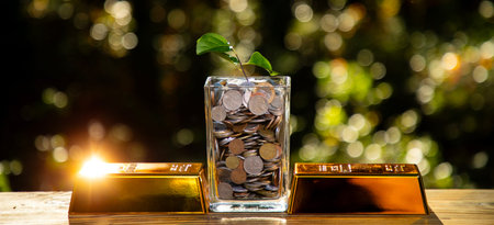 Gold investment with growth. Investment gold and savings concept. Investment in gold bar builds long...
