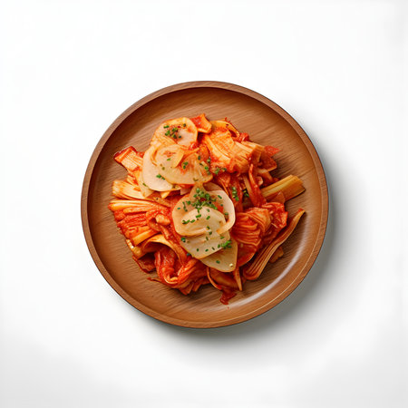 Penne pasta with tomato sauce in a plate on a white backgroundの写真素材
