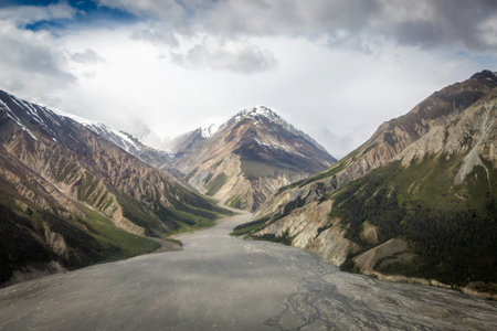 Panoramic view of a mountain valley with a river