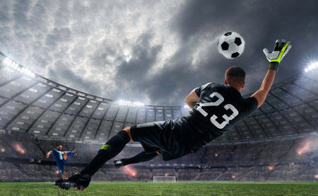 Soccer player in action at stadium. Mixed media. Mixed mediaの写真素材