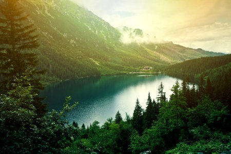 Lake in mountains. Fantasy and colorfull nature landscape. Morskie Oko lake.の写真素材