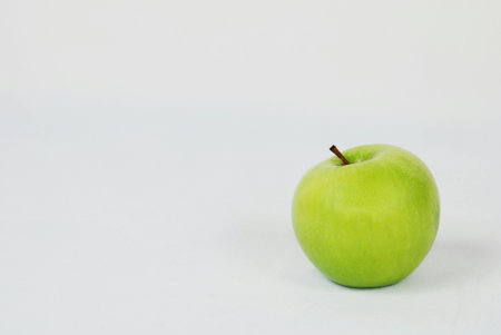 Green apple isolated on white background with copy space for your text.の写真素材