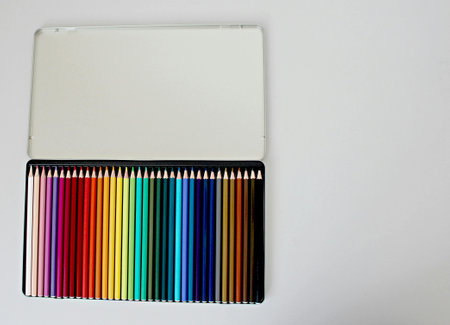 Color pencils in a box on a white background close-upの写真素材