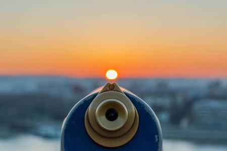 Coin Operated Binoculars overlooking the City of Budapest at Sunsetの写真素材