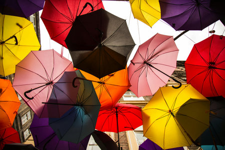 Colorful umbrellas on the streets of Lisbon, Portugal.の写真素材