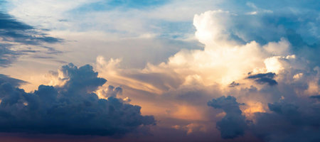 Colorful dramatic sky with cloud at sunset. Panoramic image.