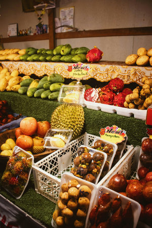 Fruit market stall with variety of fruits and vegetables