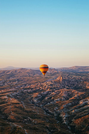 Hot air balloon flying over Cappadocia, Turkey.の写真素材