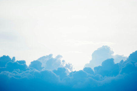 Blue sky background with tiny clouds. Nature background. Blue sky with tiny clouds.