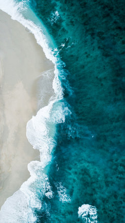 Aerial view of a beautiful sandy beach with turquoise water