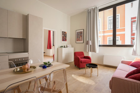 interior of a modern apartment, living room with kitchen and dining area