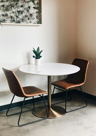 empty table and chair decoration in living room interior - Vintage Light Filter