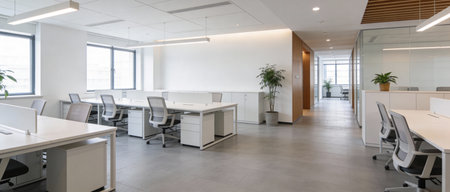 Interior of modern open space office with white walls and concrete floor