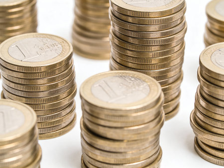 pile of coins isolated on white background, business and finance concept