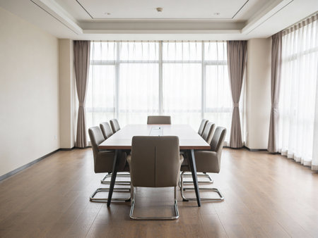 Interior of a conference room with table and chairs, nobody inside