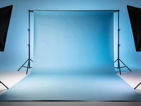 Empty photo studio with lighting equipment on blue background. 3d renderingの写真素材