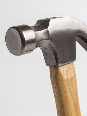 Hammer on a white background. Close-up. Macro.