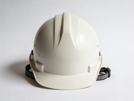 White hard hat on a white background, safety conceptの写真素材