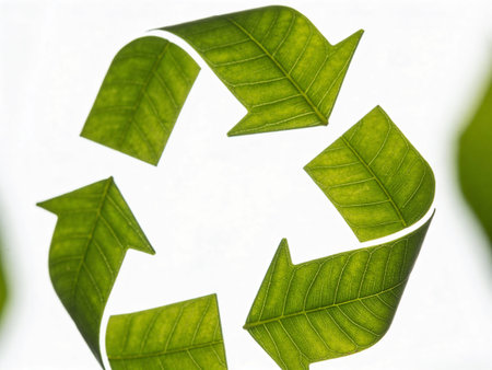 Recycling concept with green leaves in the shape of a circle