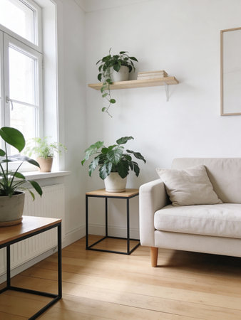 Interior of modern living room with white sofa, coffee table and plants