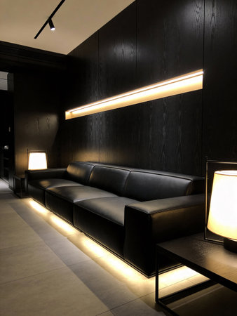 Modern interior design of a hotel room. Black sofa and lamp.の写真素材