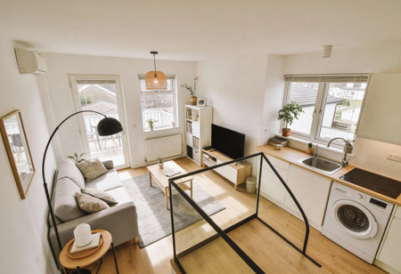 Interior of a modern house, living room with kitchen and dining areaの写真素材