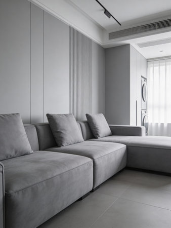 interior of a modern living room with grey sofa and white wall