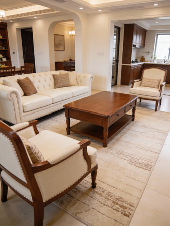 Luxury living room interior with sofa, coffee table and bookcase