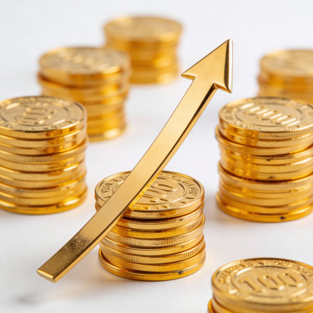 golden coins with an upward arrow on a white background, business conceptの写真素材