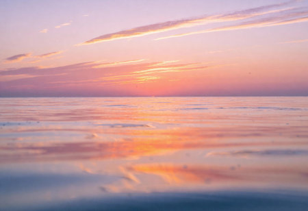 beautiful sunset over the sea with reflection in water, nature seriesの写真素材