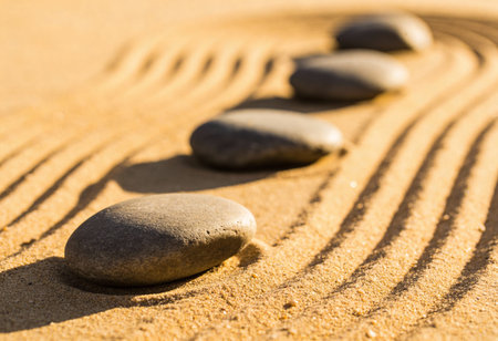 zen garden meditation stone in sand, concept of zen and harmonyの写真素材