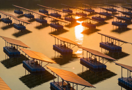 Solar panels in the lake at sunset,Thailand. Selective focus.の写真素材