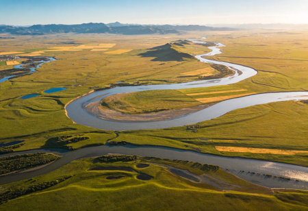 Aerial view of the river and meadowsの写真素材