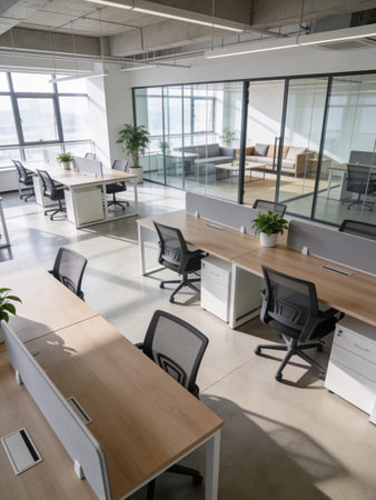 Interior of a modern office with white walls and a lot of windowsの写真素材