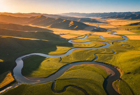 Aerial view of the river in the mountains at sunset, Qinghai, Chinaの写真素材