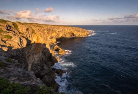 Beautiful sunset at the cliffs of Ponta da Piedade, Portugalの写真素材