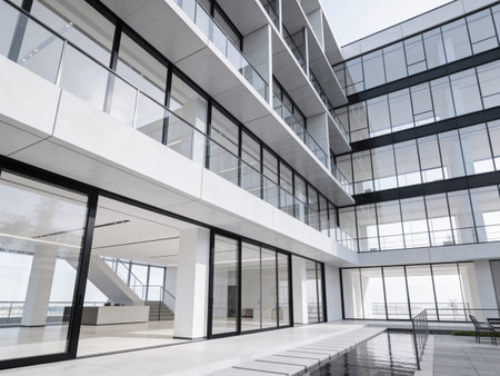 Modern office building exterior with glass walls and floor. Perspective view.