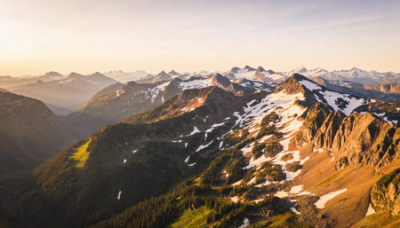 Panoramic view of mountains at sunsetの写真素材