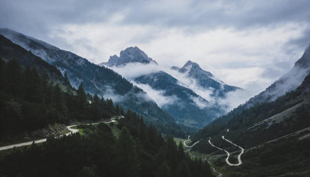 Beautiful landscape of hills and trees at sunsetの写真素材