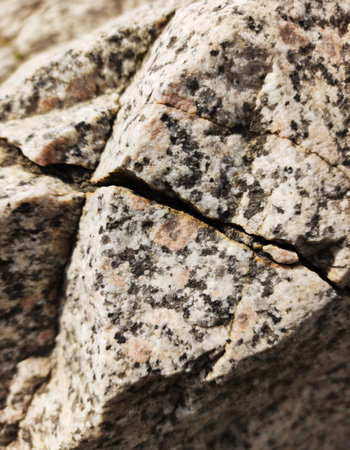 Close up of granite rock texture. Macro shot. Natural background.