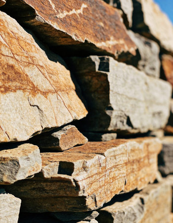closeup of a wall made of natural stone, photo as a background, digital image