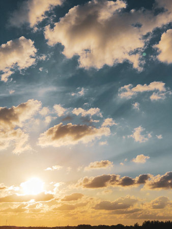 Beautiful sunset sky with clouds. Nature background. Toned.の写真素材